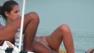 Girl with good whoppers on the beach Espana voyeur clip